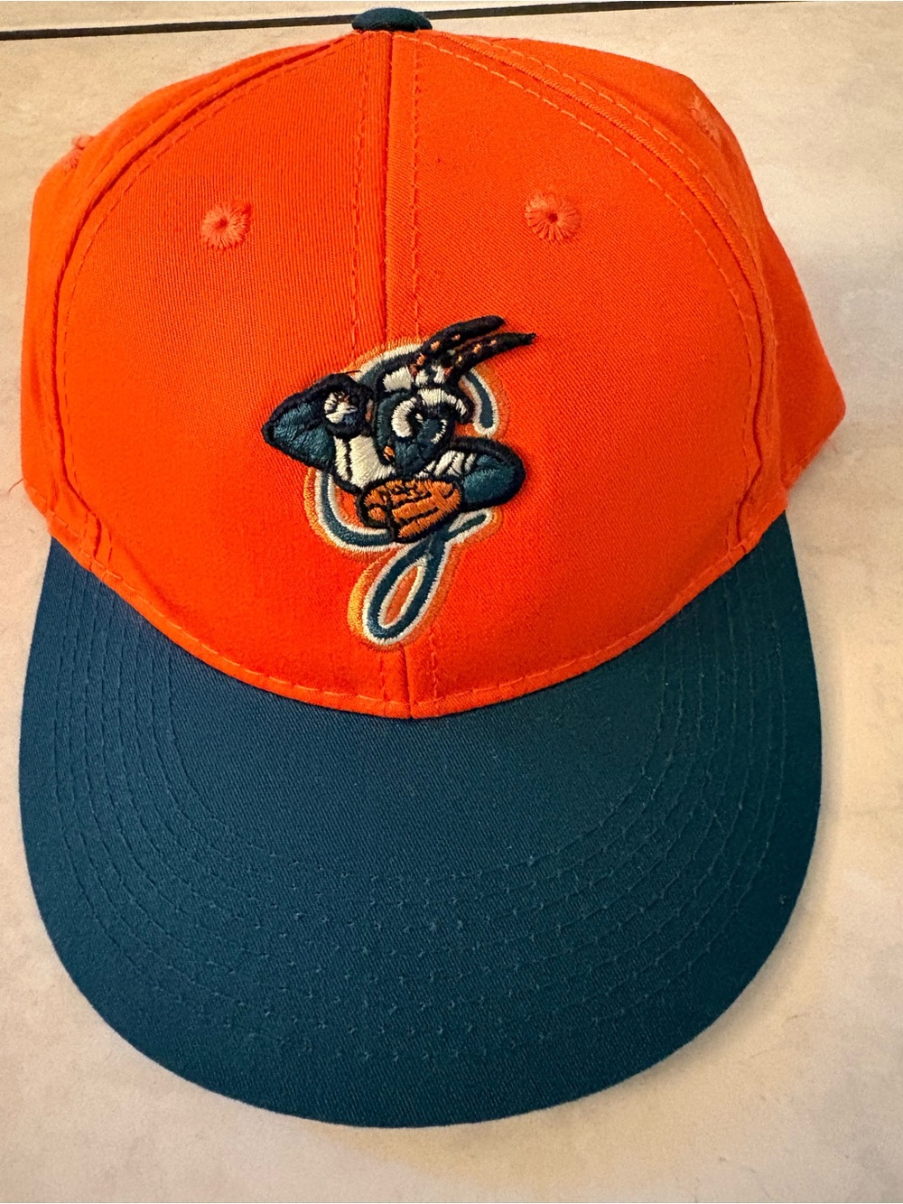 Greensboro Grasshoppers Orange and Teal Baseball Cap with Embroidered Mascot